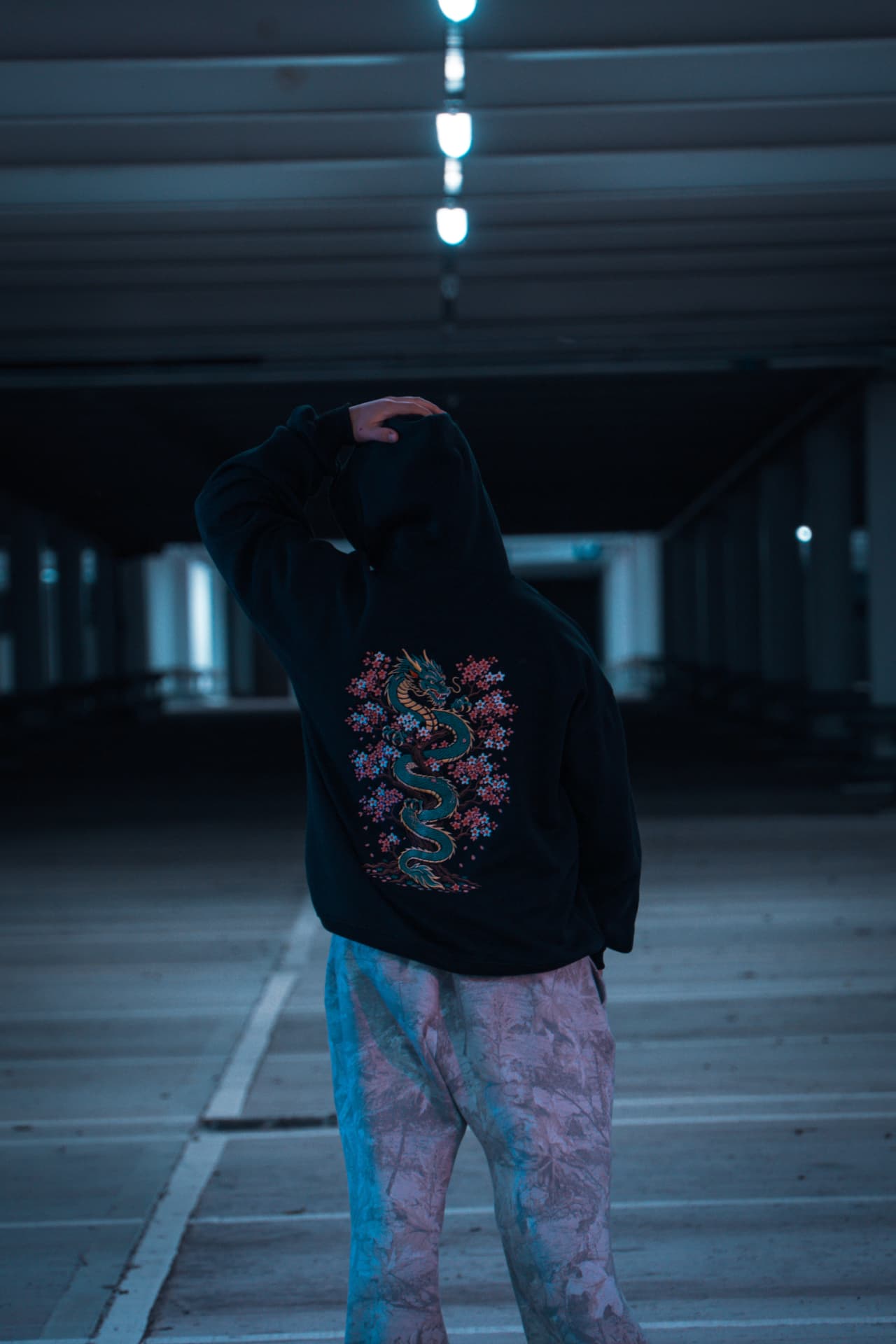 Black heavyweight hoodie with emerald dragon and sakura back print